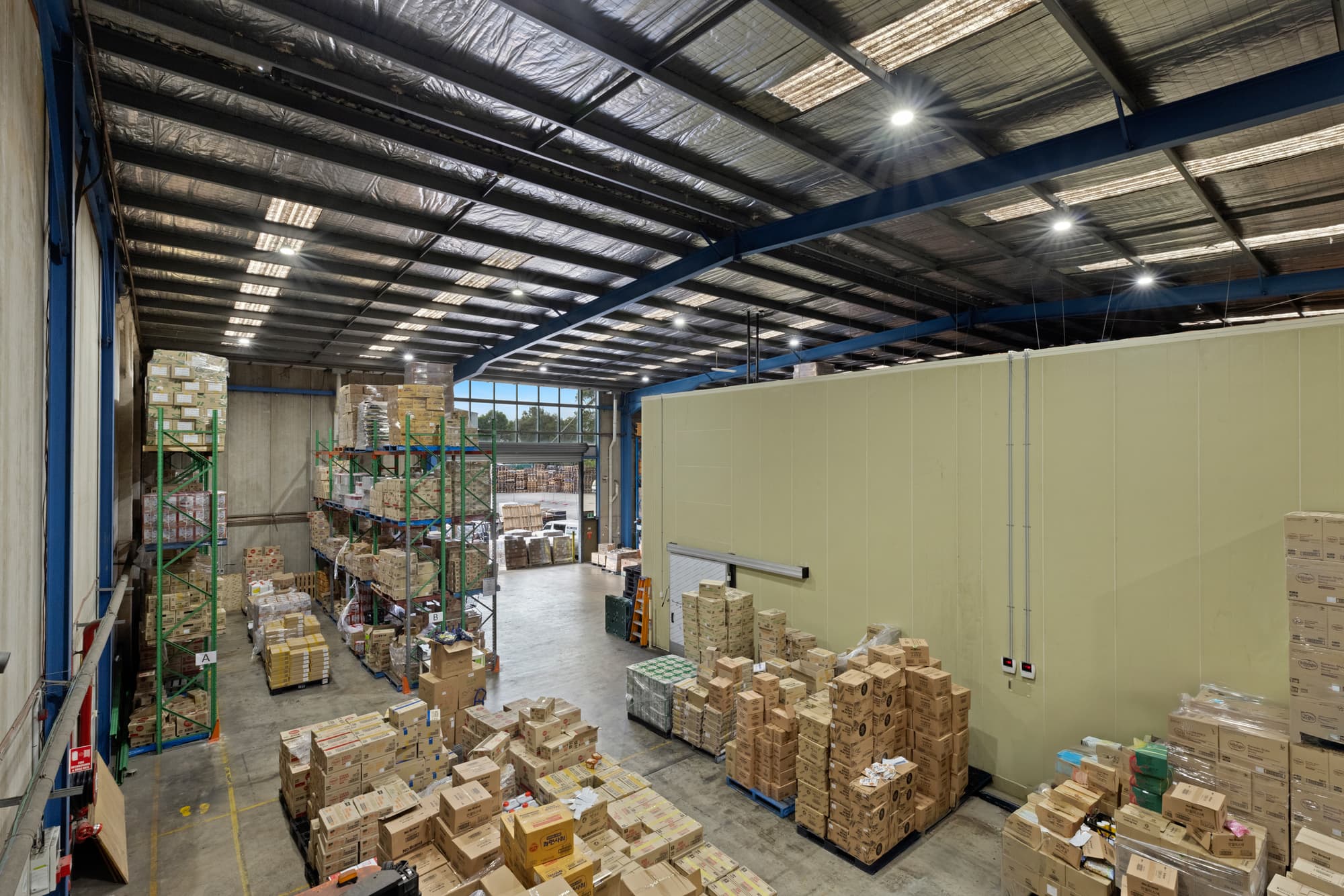 Pallets and cartons in the JSQUARED warehouse in Sydney